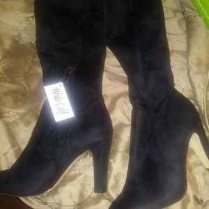 Knee high suede heels